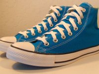 Cyan Space High Top Chucks  Angled side view of cyan space high tops.